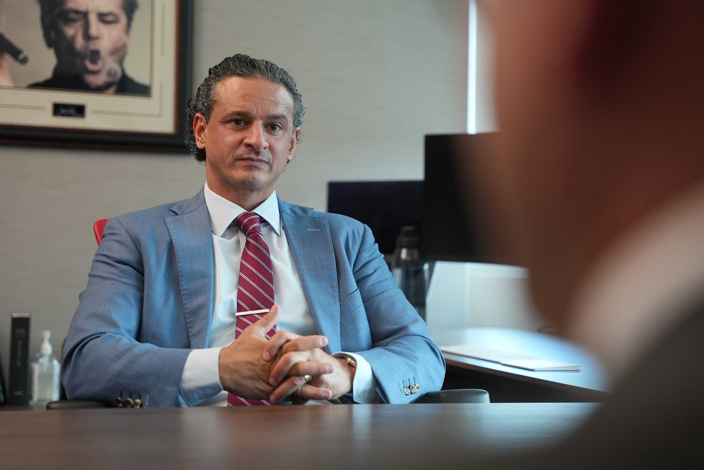 Attorney Chris Tadros meeting with a client after a workplace injury